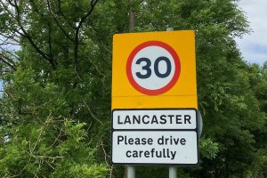 lancaster-road-sign-please-drive-carefully-300x200.jpg