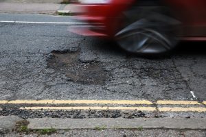 local-road-roads-damage-pothole-300x200.jpg